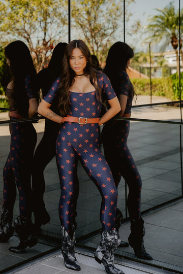 MACACÃO PRINCESS STARS DARK MARINHO COFFEE